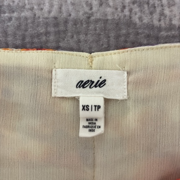 Aerie Wrap Tie Dye Mini Skirt — Cream Skirt with Orange/Purple Tie Dye Pattern - Picture 7 of 7